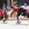 PARIS, FRANCE - MAY 13: Switzerland's Dean Kukan #34 checks Canada's Mark Scheifele #55 while his teammate Mitch Marner #16 looks on during preliminary round action at the 2017 IIHF Ice Hockey World Championship. (Photo by Matt Zambonin/HHOF-IIHF Images)
